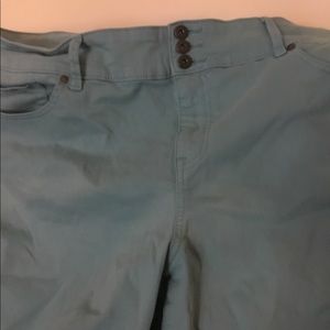 Torrid aqua jeggings size 24w.  3 button one zipper fastenings